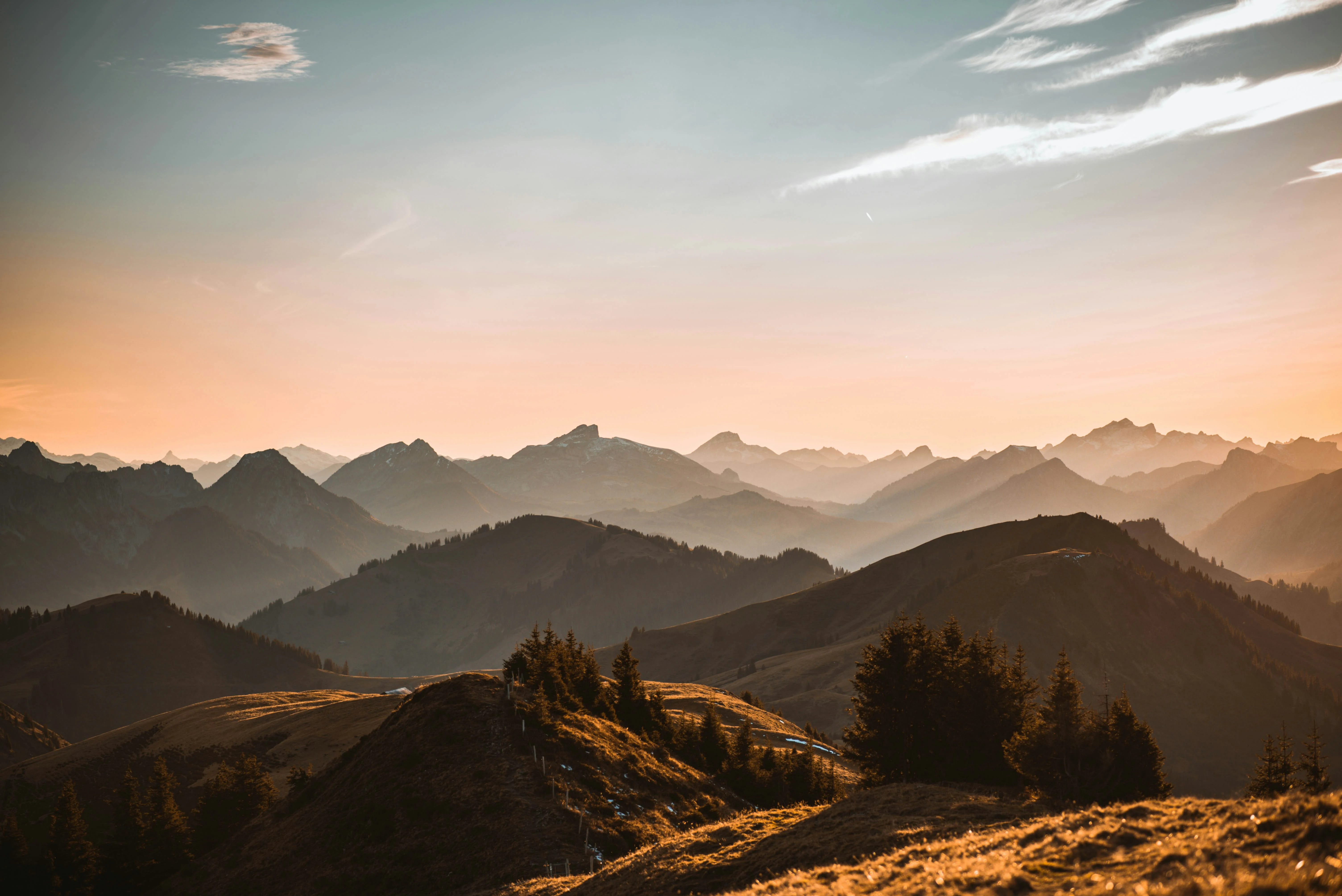 brown and green mountains under blue sky during daytime — reaching peak performance