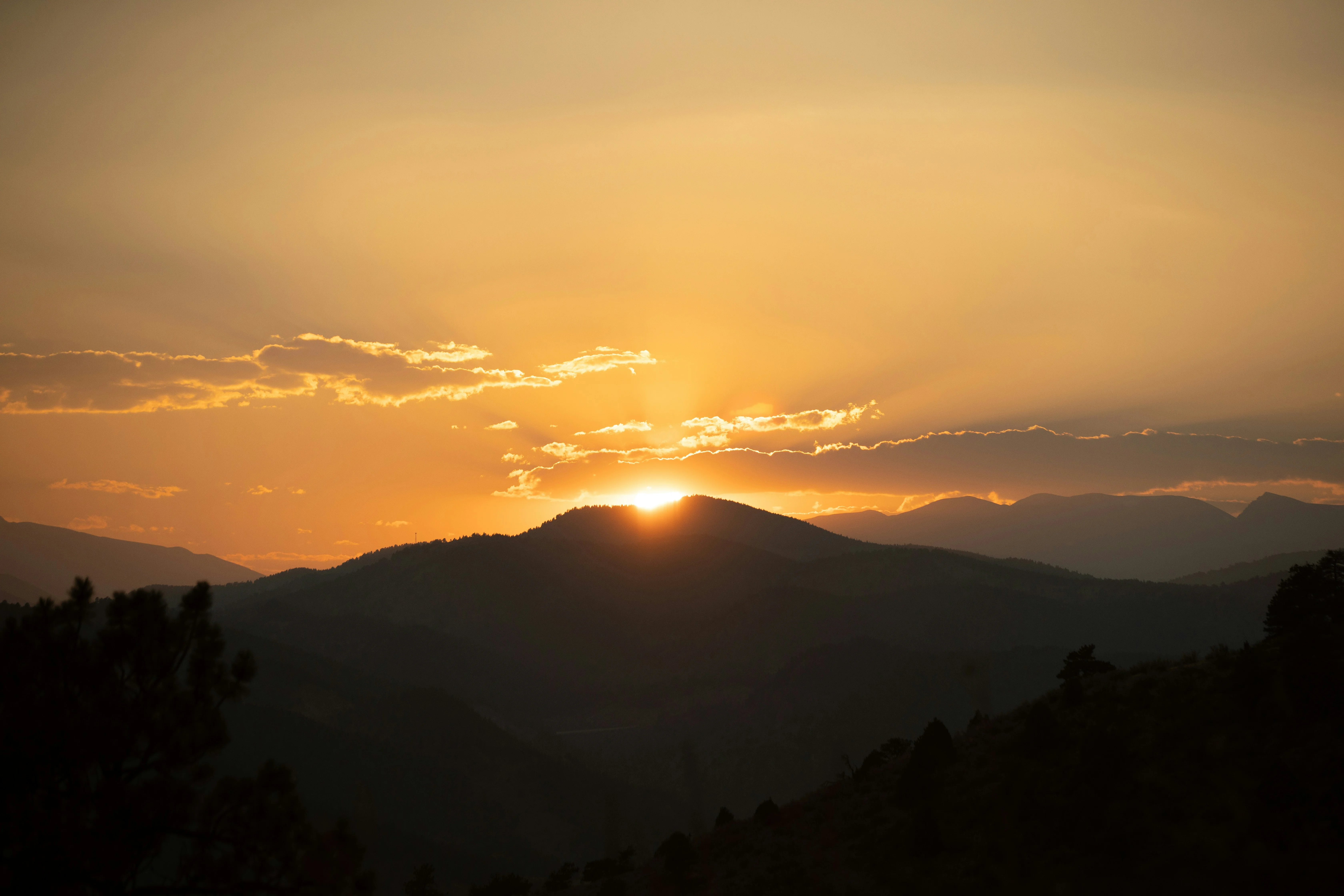 silhouette of mountains during sunset — reaching peak performance