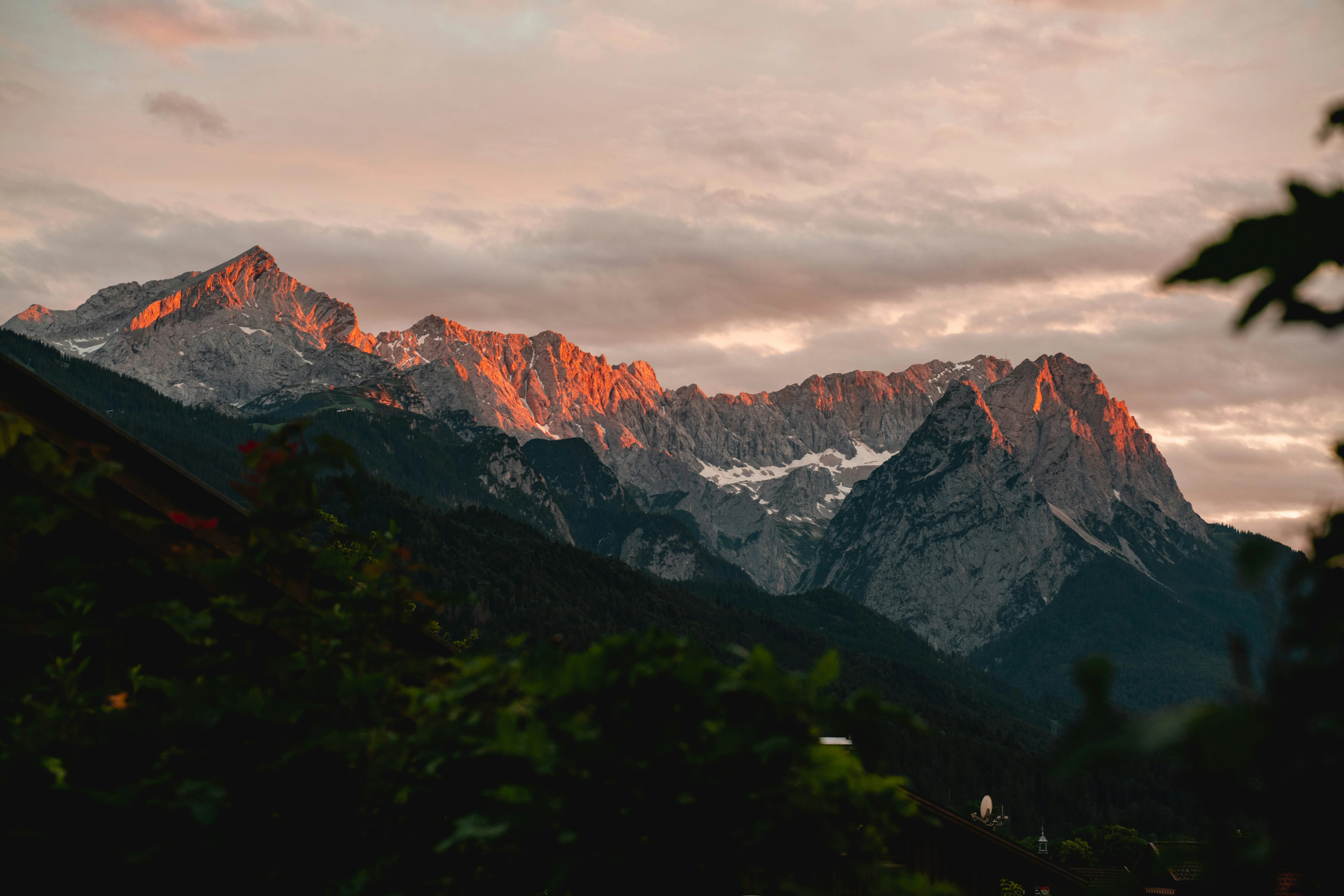 brown and white mountain under cloudy sky during daytime — reaching peak performance
